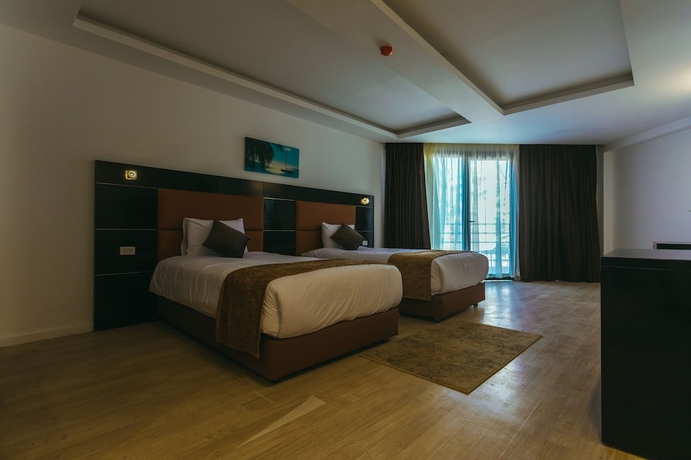 Imagen de la habitación del Hotel La Rosa Waves Beach - Couple and Families Only. Foto 10