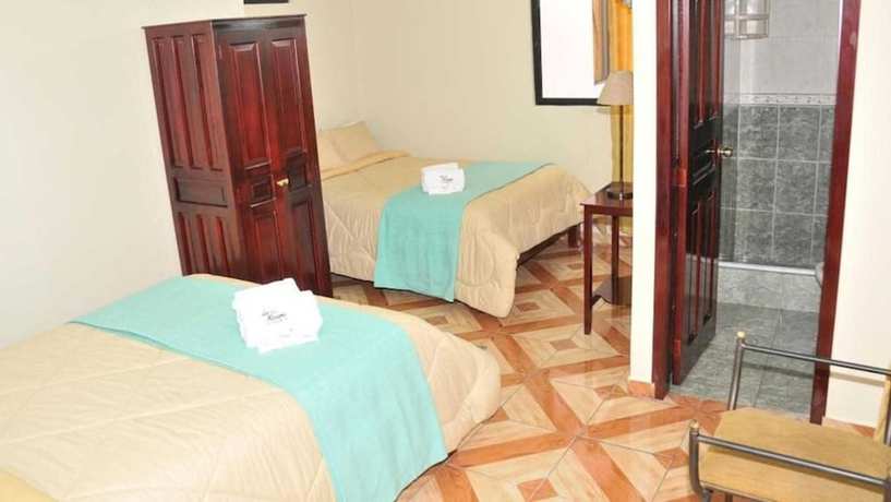 Imagen de la habitación del Hotel La Rosario. Foto 1