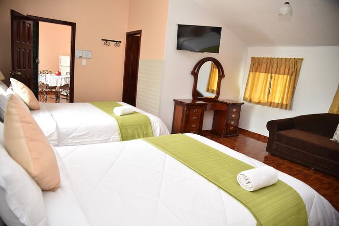 Imagen de la habitación del Hotel La Rosario. Foto 8