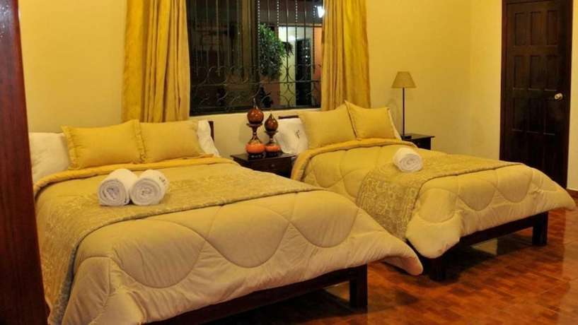 Imagen de la habitación del Hotel La Rosario. Foto 12