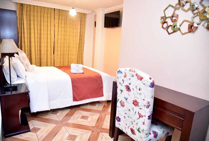 Imagen de la habitación del Hotel La Rosario. Foto 13