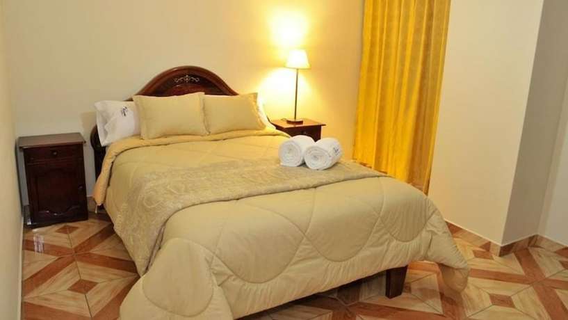 Imagen de la habitación del Hotel La Rosario. Foto 16