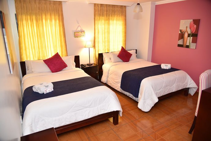 Imagen de la habitación del Hotel La Rosario. Foto 18