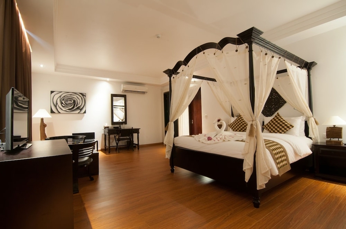 Imagen de la habitación del Hotel La Rose Suites. Foto 2
