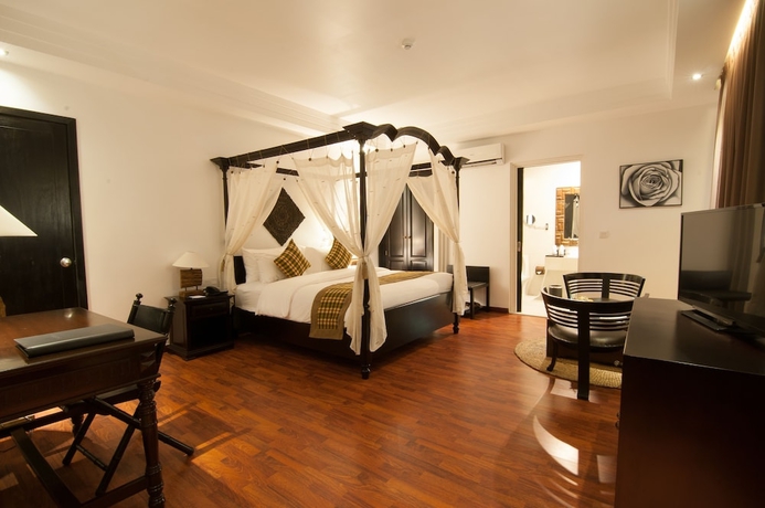 Imagen de la habitación del Hotel La Rose Suites. Foto 3
