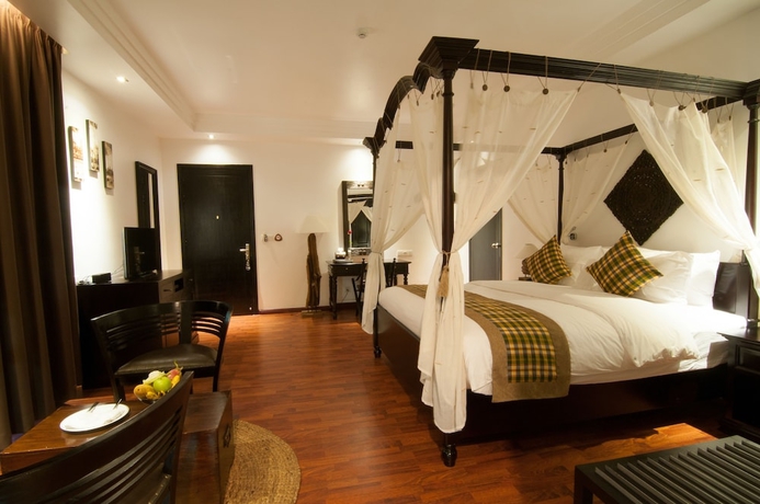 Imagen de la habitación del Hotel La Rose Suites. Foto 4