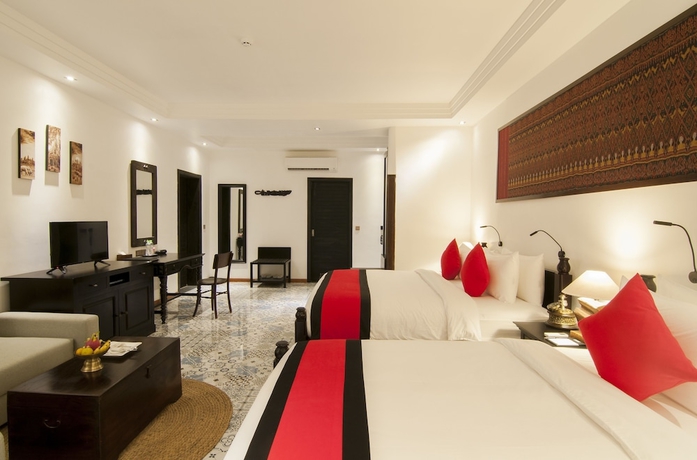 Imagen de la habitación del Hotel La Rose Suites. Foto 6