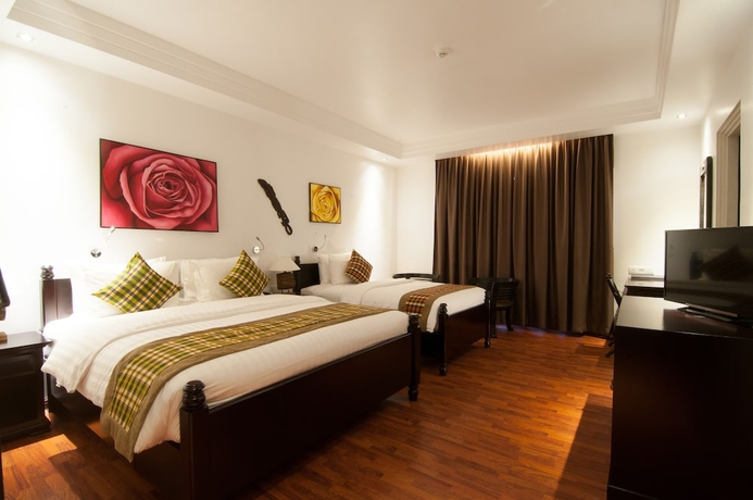 Imagen de la habitación del Hotel La Rose Suites. Foto 8