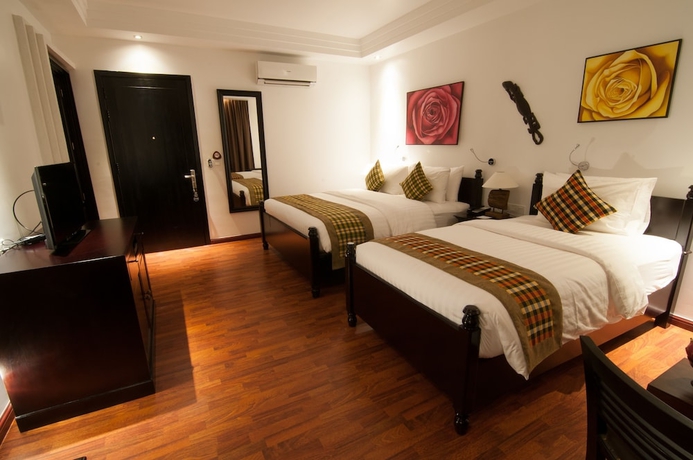 Imagen de la habitación del Hotel La Rose Suites. Foto 9