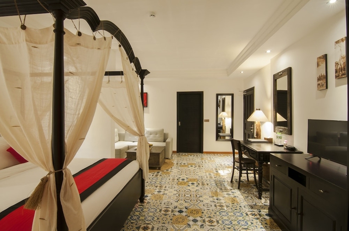 Imagen de la habitación del Hotel La Rose Suites. Foto 11