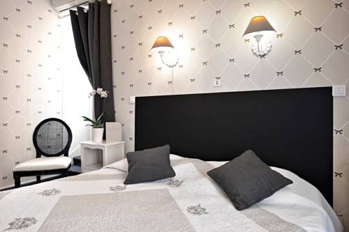 Imagen de la habitación del Hotel La Roseraie, CHENONCEAUX. Foto 10