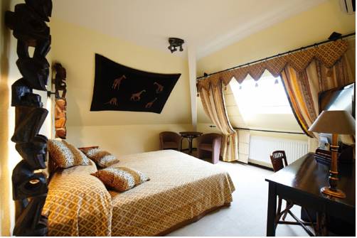 Imagen de la habitación del Hotel La Roseraie. Foto 7