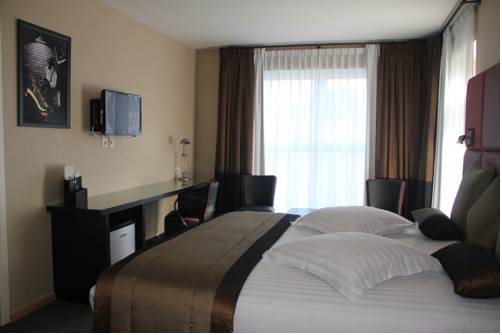 Imagen de la habitación del Hotel La Roseraie. Foto 15