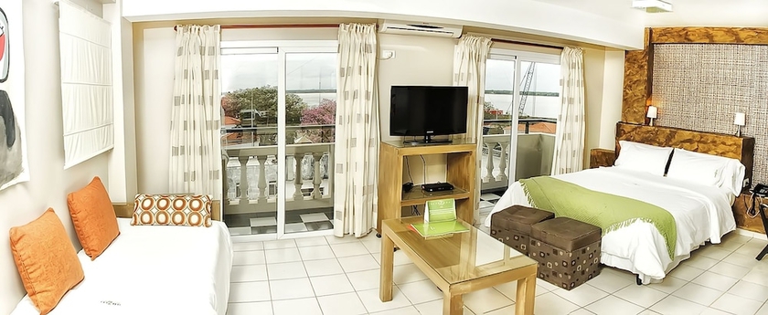 Imagen de la habitación del Hotel La Rozada Suites. Foto 5