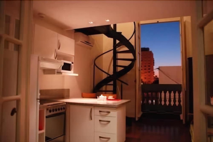 Imagen de la habitación del Hotel La Rozada Suites. Foto 13