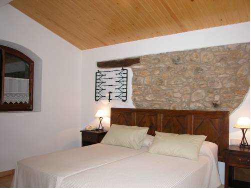 Imagen de la habitación del Hotel La Sala de Camós. Foto 4