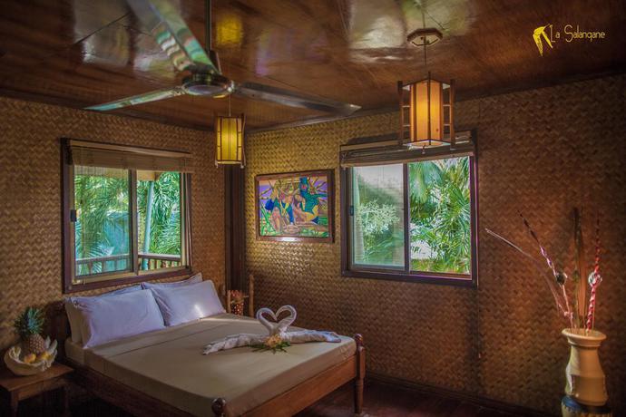 Imagen de la habitación del Hotel La Salangane Caalan Beach Villa. Foto 12