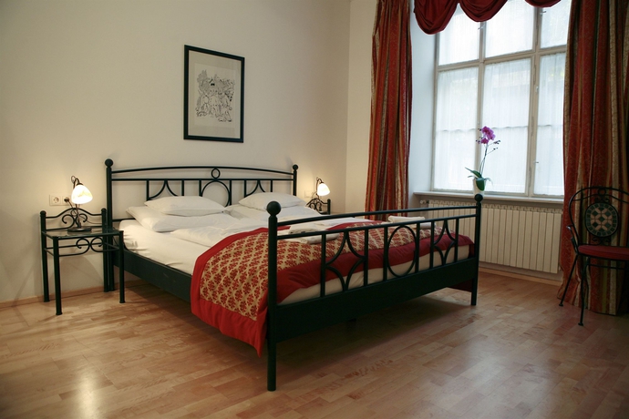 Imagen de la habitación del Hotel La Scala Apartments. Foto 4