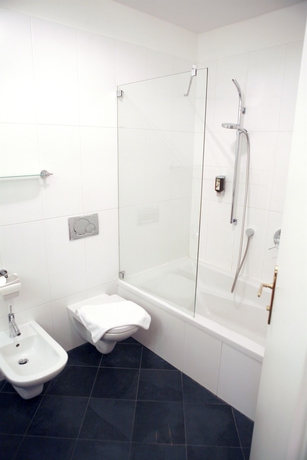 Imagen de la habitación del Hotel La Scala Apartments. Foto 5