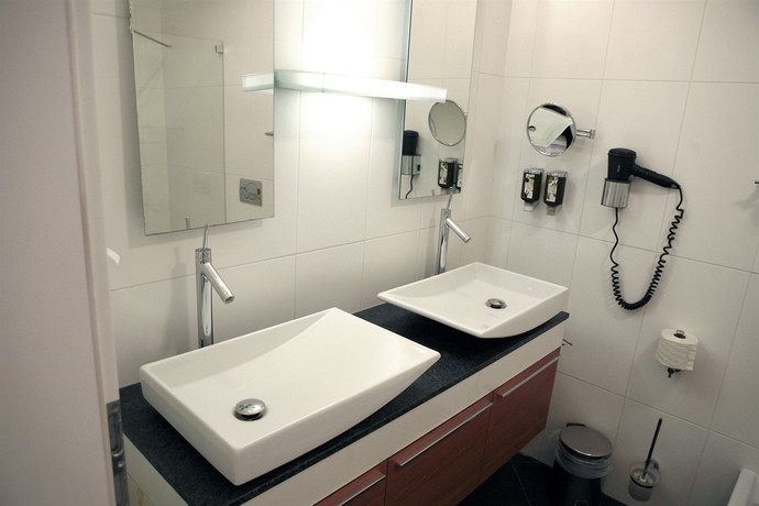 Imagen de la habitación del Hotel La Scala Apartments. Foto 7