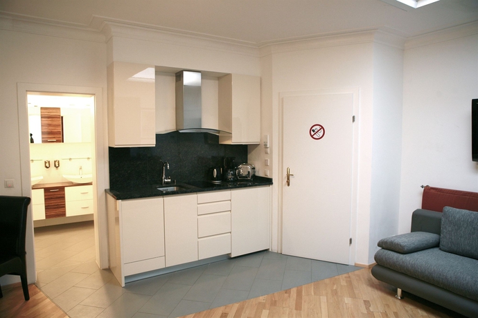 Imagen de la habitación del Hotel La Scala Apartments. Foto 10