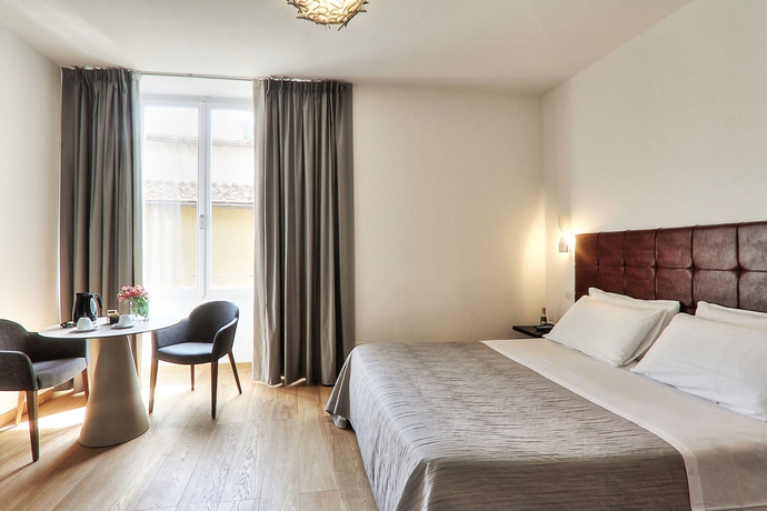 Imagen de la habitación del Hotel La Scaletta Al Ponte Vecchio. Foto 11
