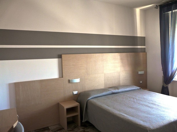 Imagen de la habitación del Hotel La Scaletta. Foto 10