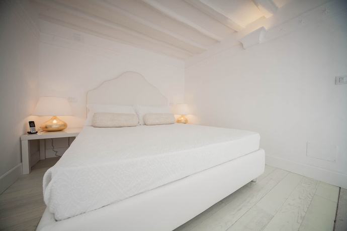 Imagen de la habitación del Hotel La Settima Luna. Foto 8