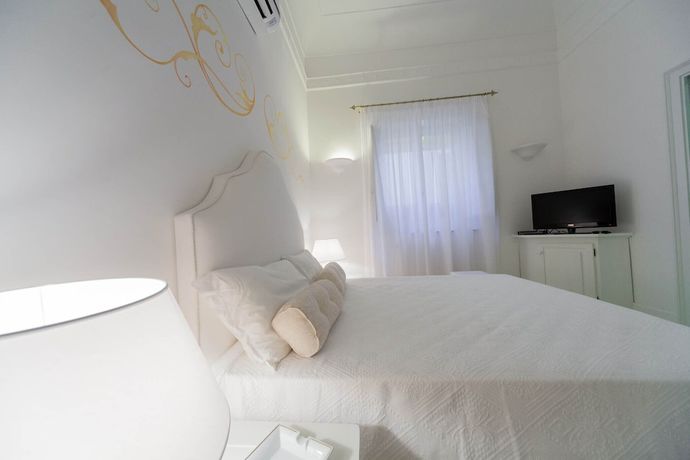 Imagen de la habitación del Hotel La Settima Luna. Foto 10