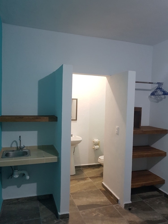 Imagen de la habitación del Hotel La Siesta Del Patron. Foto 2