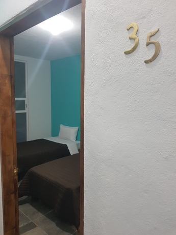 Imagen de la habitación del Hotel La Siesta Del Patron. Foto 5