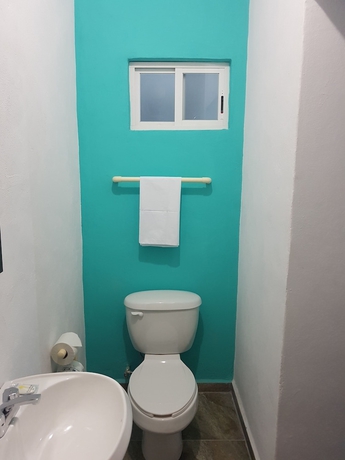 Imagen de la habitación del Hotel La Siesta Del Patron. Foto 6
