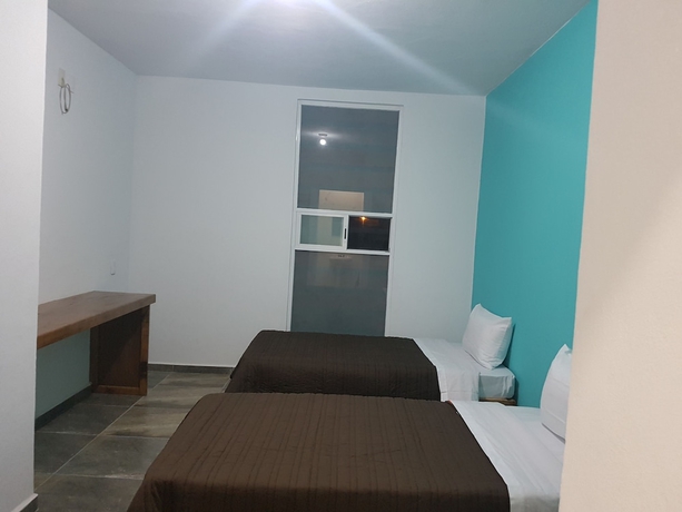 Imagen de la habitación del Hotel La Siesta Del Patron. Foto 7