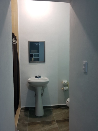 Imagen de la habitación del Hotel La Siesta Del Patron. Foto 10