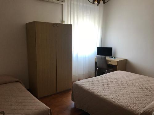 Imagen de la habitación del Hotel La Sirenetta. Foto 8