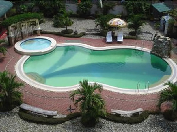 Imagen de la piscina del Hotel La Solana Suites And Resort. Foto 18