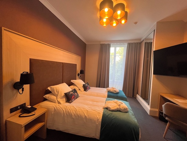 Imagen de la habitación del Hotel La Souveraine. Foto 19