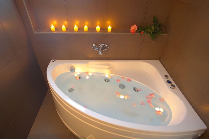 Imagen de la habitación del Hotel La Stella Suites. Foto 7