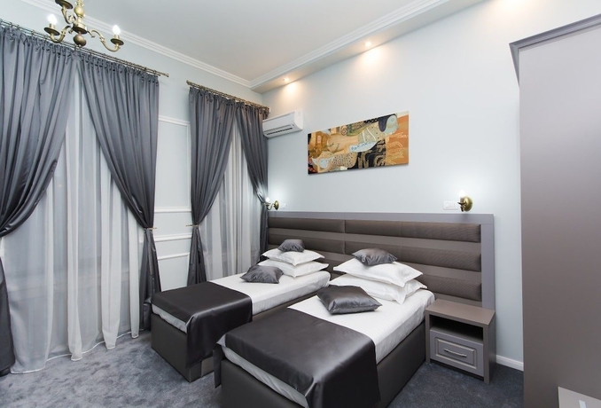 Imagen de la habitación del Hotel La Strada Boutique Villa. Foto 2