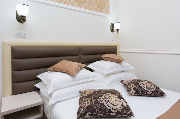 Imagen de la habitación del Hotel La Strada Boutique Villa. Foto 4