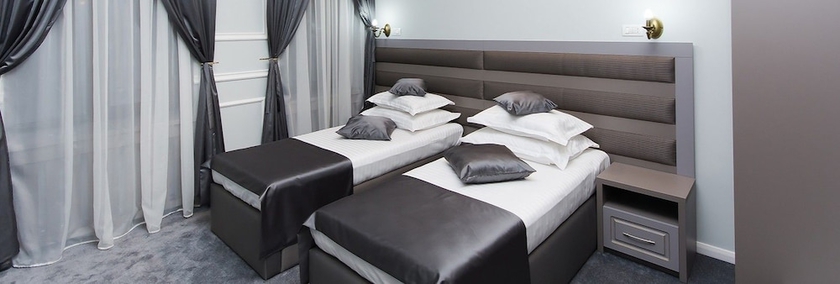 Imagen de la habitación del Hotel La Strada Boutique Villa. Foto 5