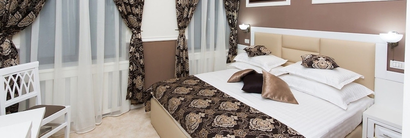 Imagen de la habitación del Hotel La Strada Boutique Villa. Foto 7