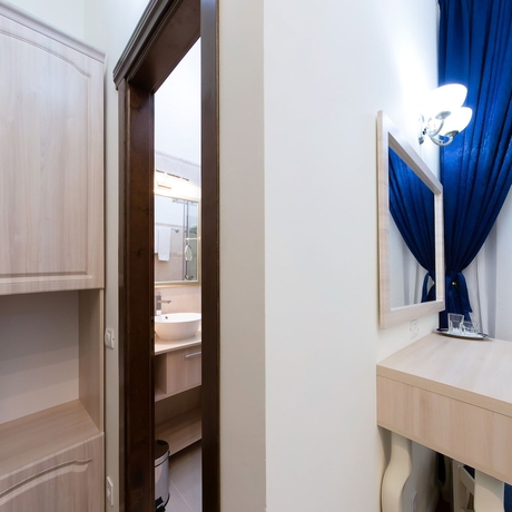 Imagen de la habitación del Hotel La Strada Boutique Villa. Foto 9