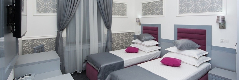 Imagen de la habitación del Hotel La Strada Boutique Villa. Foto 10