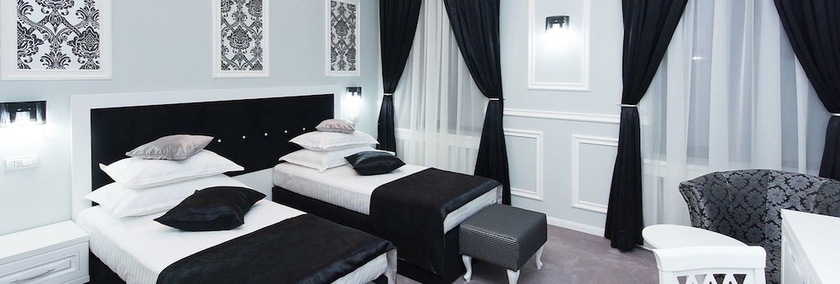 Imagen de la habitación del Hotel La Strada Boutique Villa. Foto 14