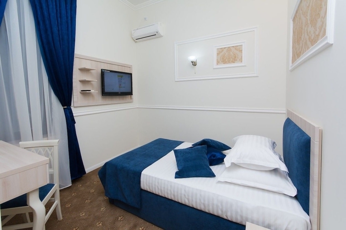 Imagen de la habitación del Hotel La Strada Boutique Villa. Foto 15