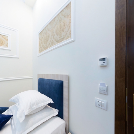 Imagen de la habitación del Hotel La Strada Boutique Villa. Foto 16