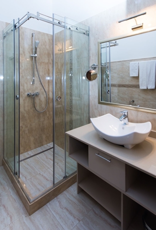 Imagen de la habitación del Hotel La Strada Boutique Villa. Foto 18