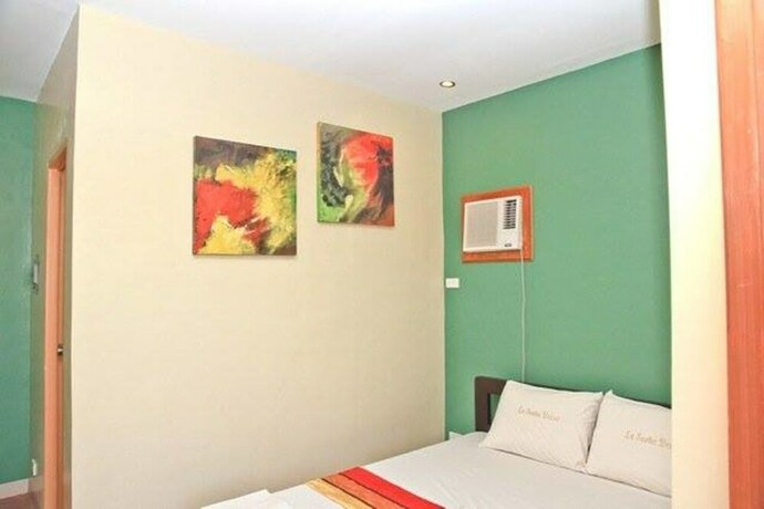 Imagen de la habitación del Hotel La Sue&ntilde;a Brisa Beach Resort and Events Place. Foto 21