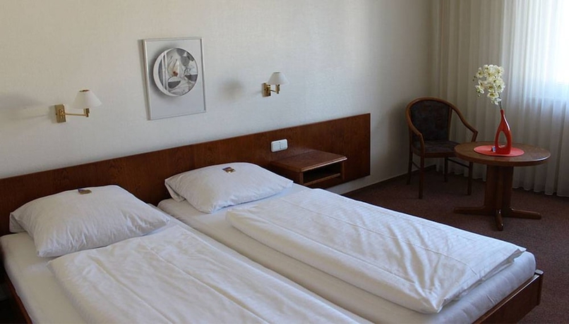 Imagen de la habitación del Hotel La Taverna. Foto 8